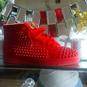 Louboutin red spike shoe